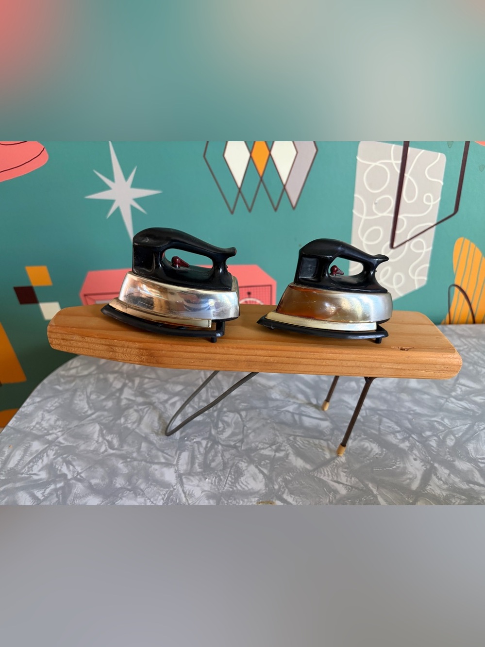Pair of Vintage salt and pepper Irons and ironing board
